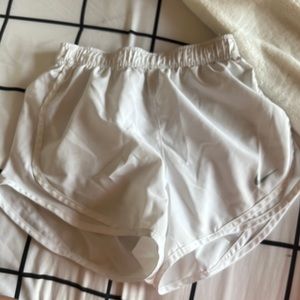- white nike running shorts